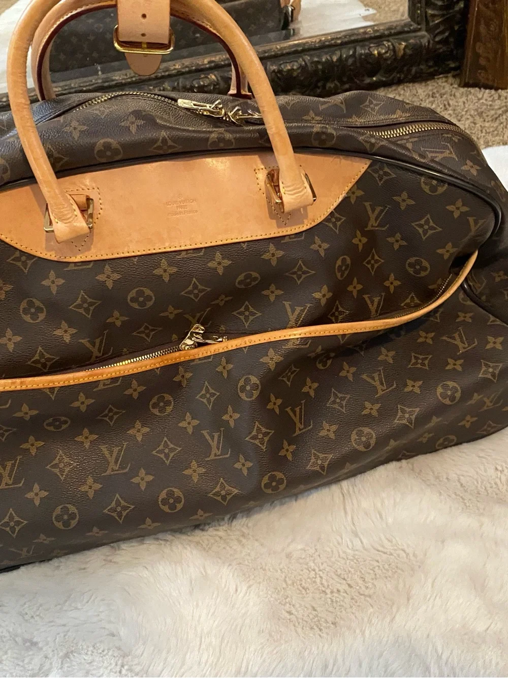 Louis Vuitton Monogram Canvas rolling Travel Bag with Natural Vachetta Trim